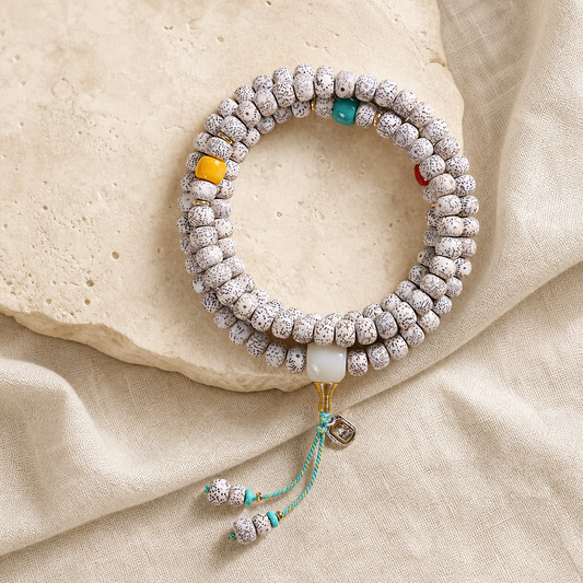 Star Moon Bodhi 108 mala with white seed-style beads and colorful accent beads