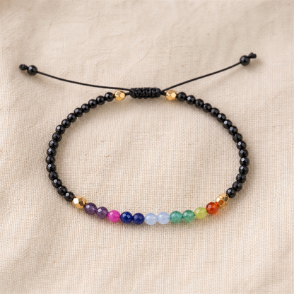 Black adjustable bracelet with multicolour faceted bead centre