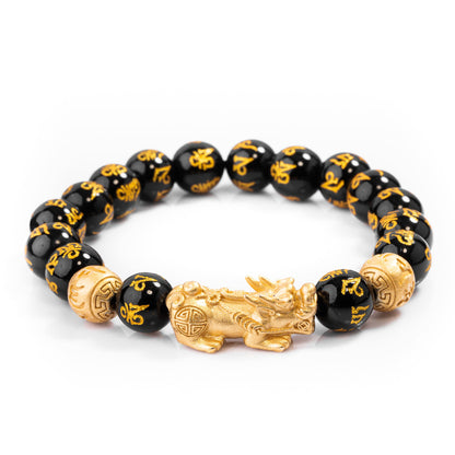 Feng Shui Pixiu Black Obsidian Bracelet — worn on wrist for scale