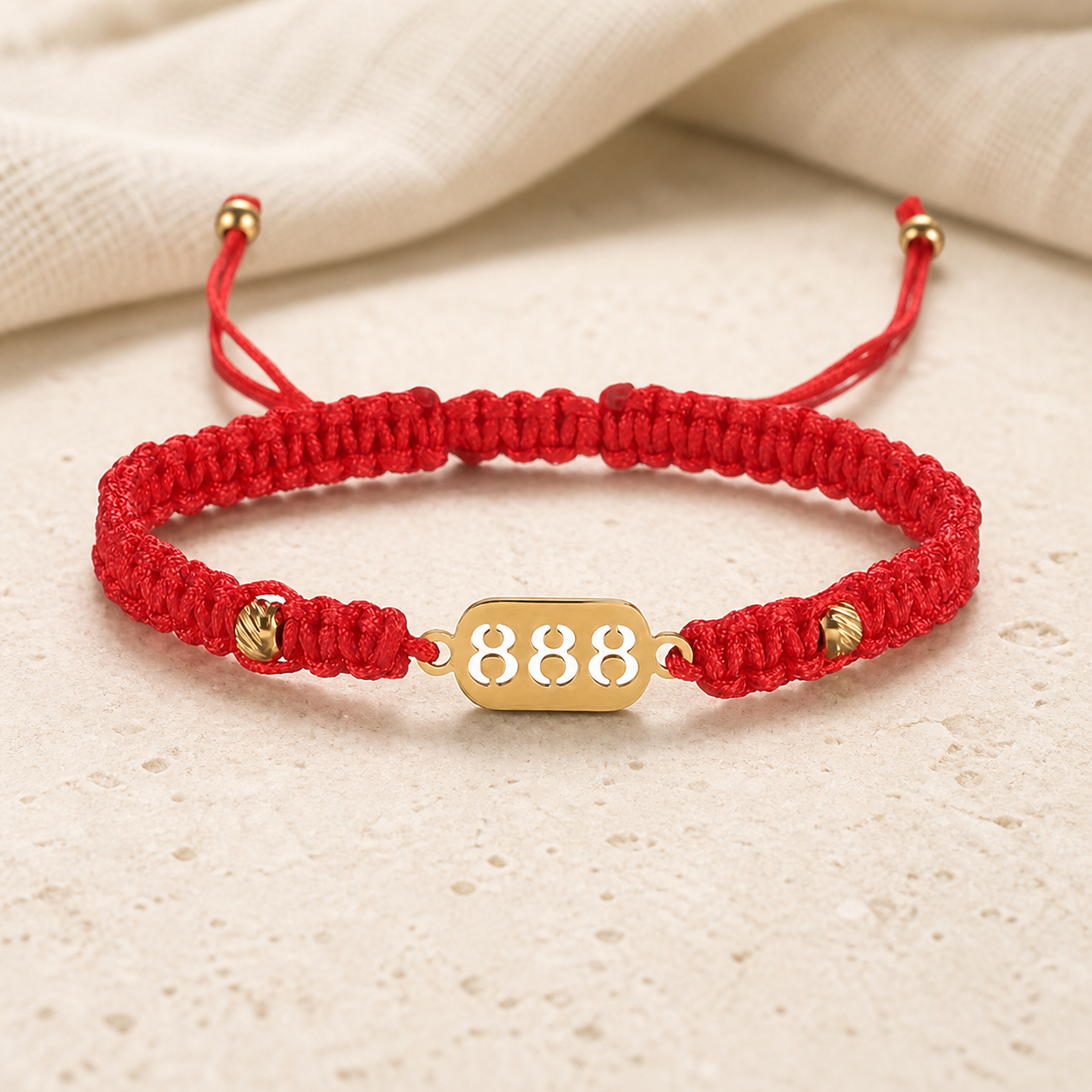 888 Angel Number Bracelet front view with adjustable red cord and gold 888 plate