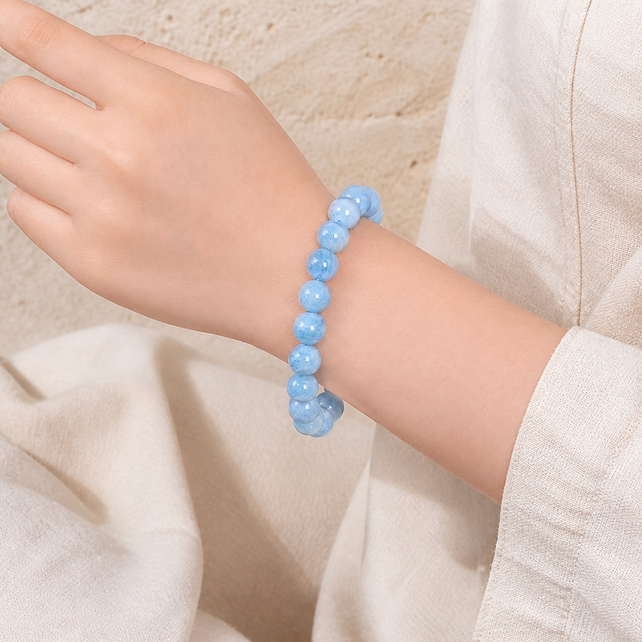 Aquamarine bracelet worn on a wrist