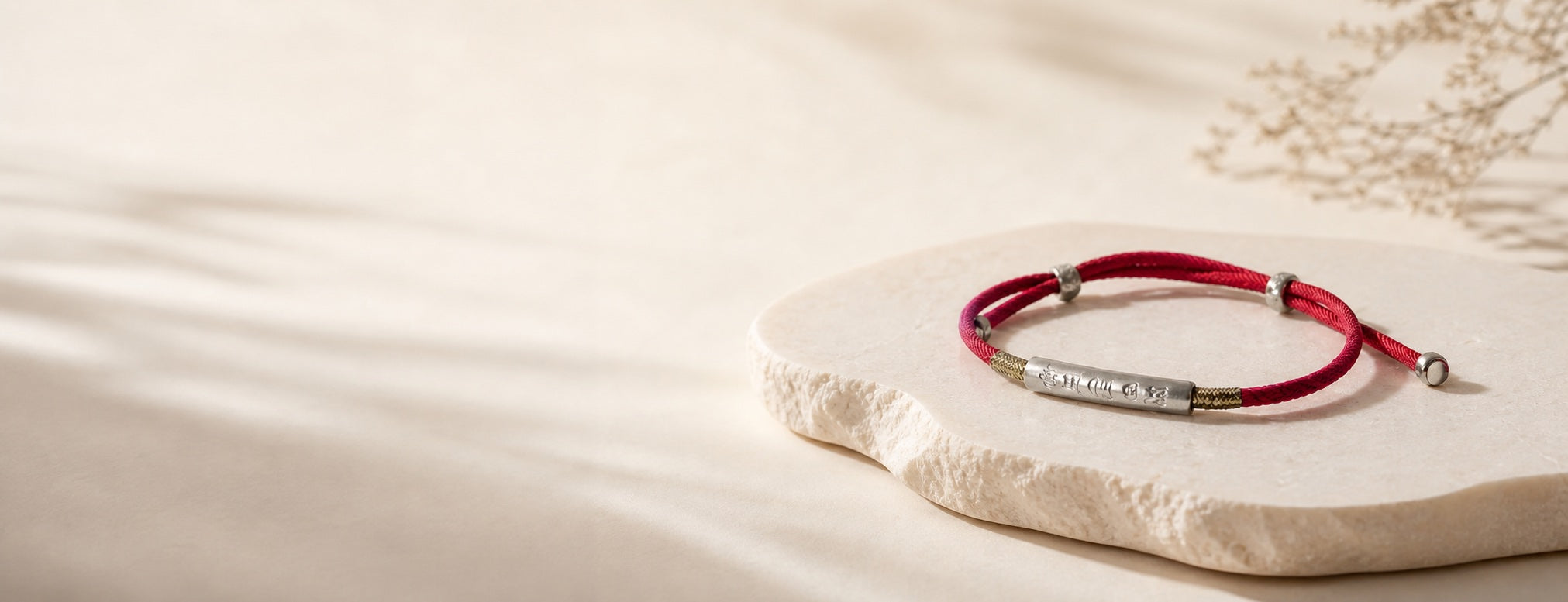 Buddha Bloom red string bracelet hero - desktop