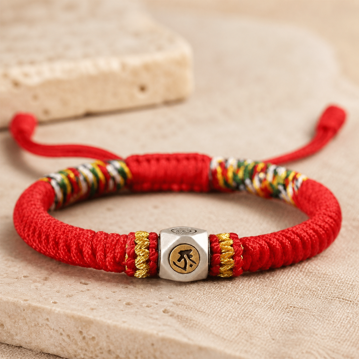 Red Chinese zodiac guardian rope bracelet with engraved metal medallion