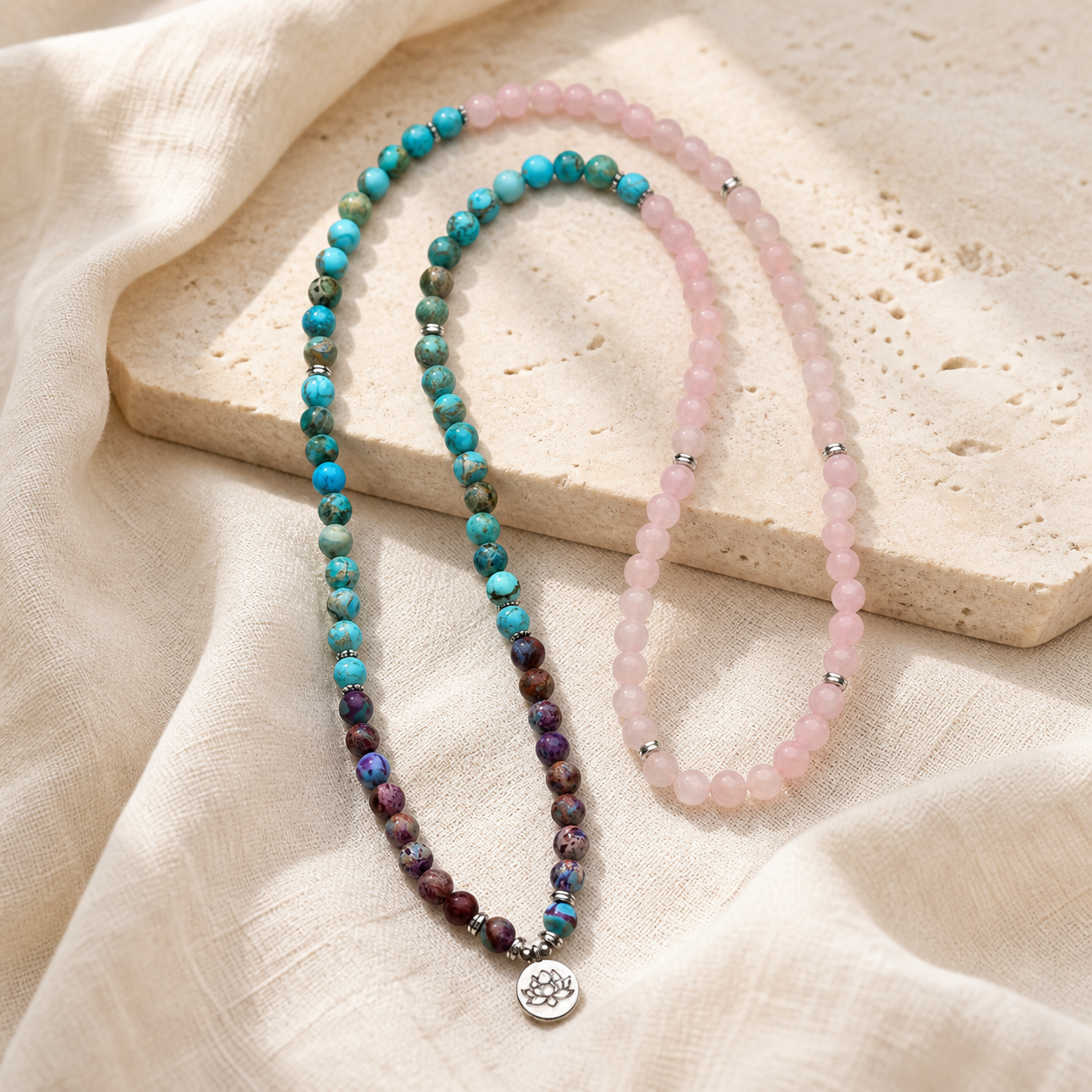 Lotus of Calm mala beads full strand arrangement on cream linen